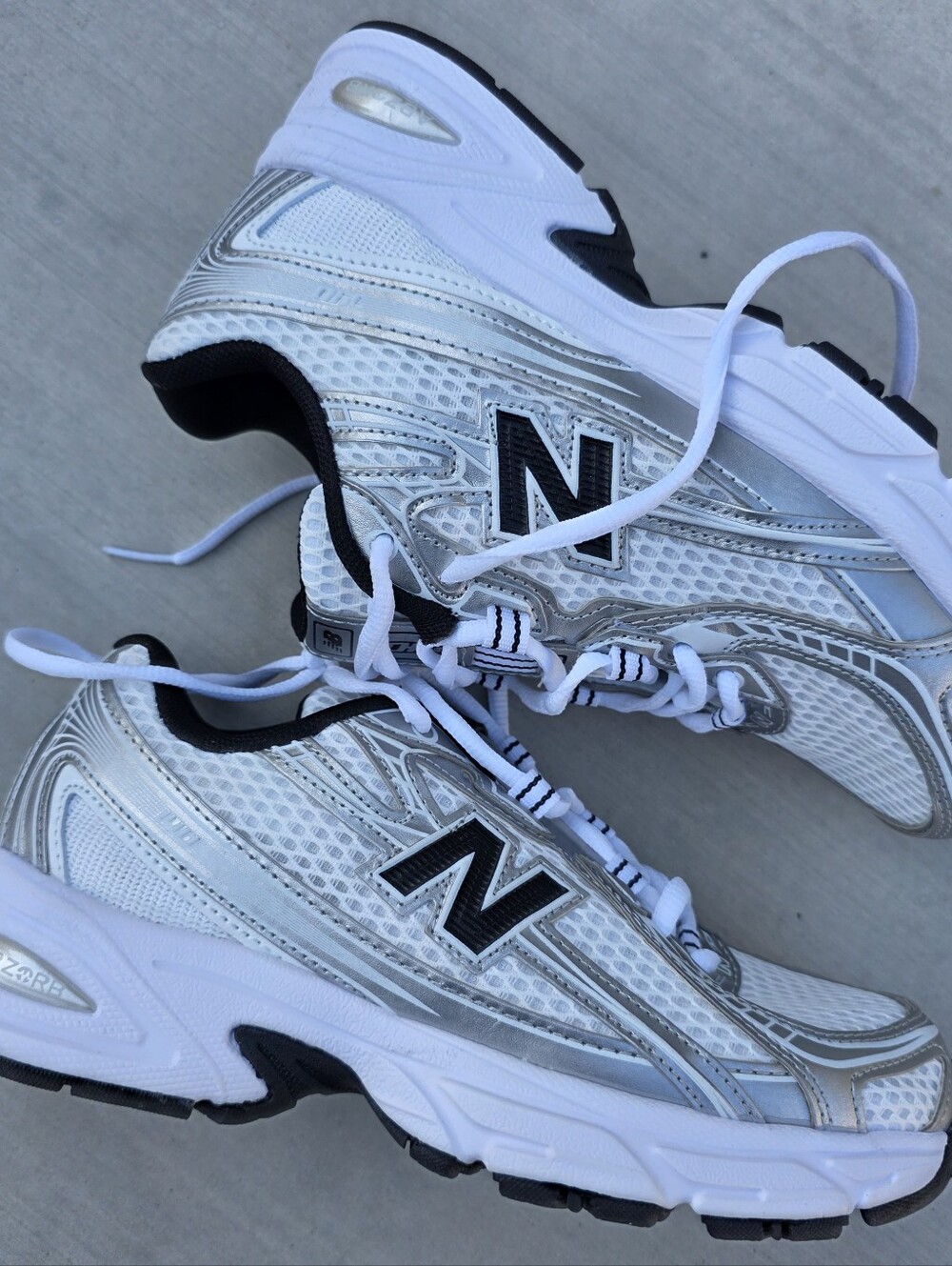 New Balance | White and Silver Sneakers